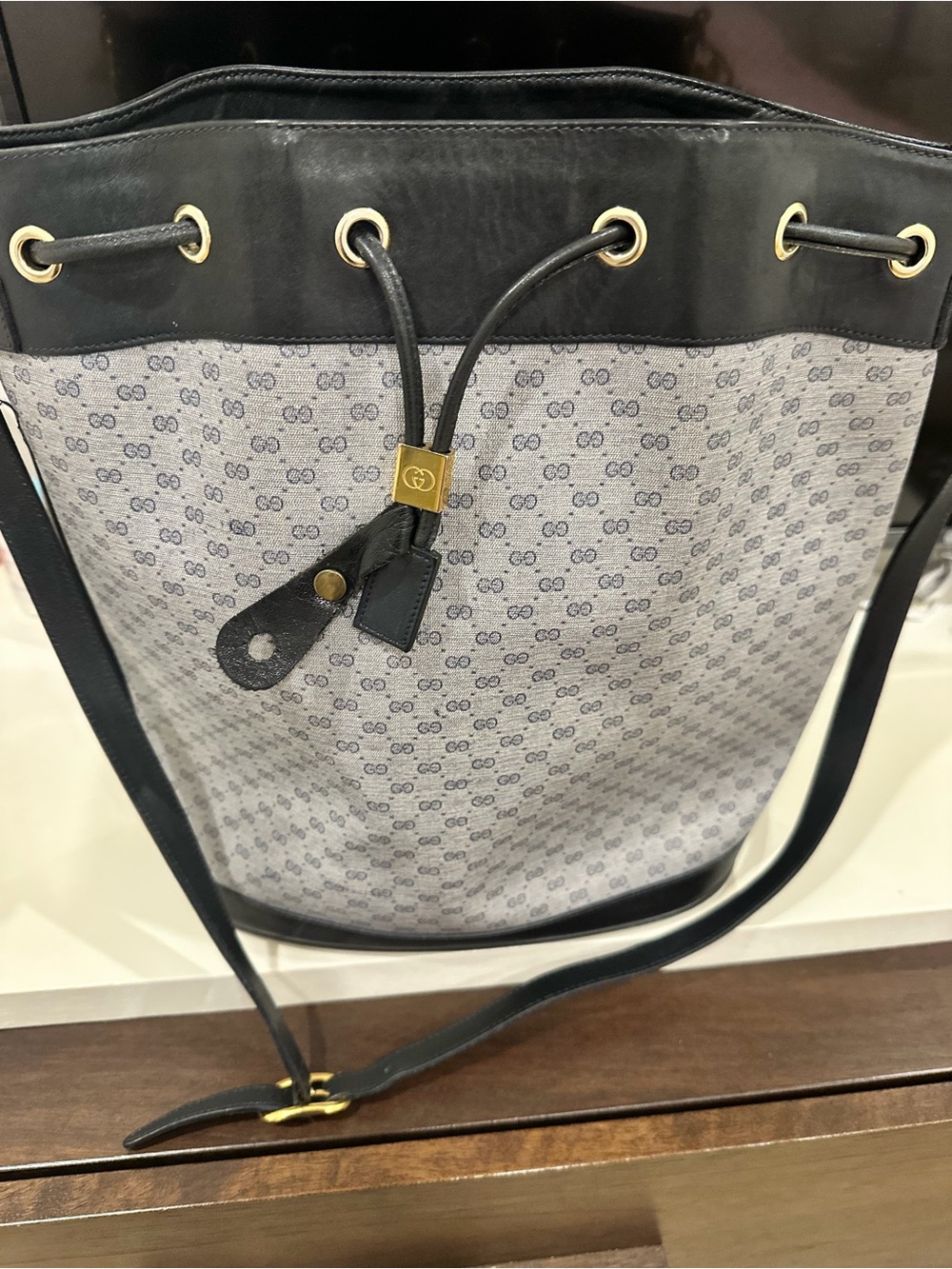 Gucci Gray Monogram Bucket Bag with Black Leather Trim and Gold Hardware